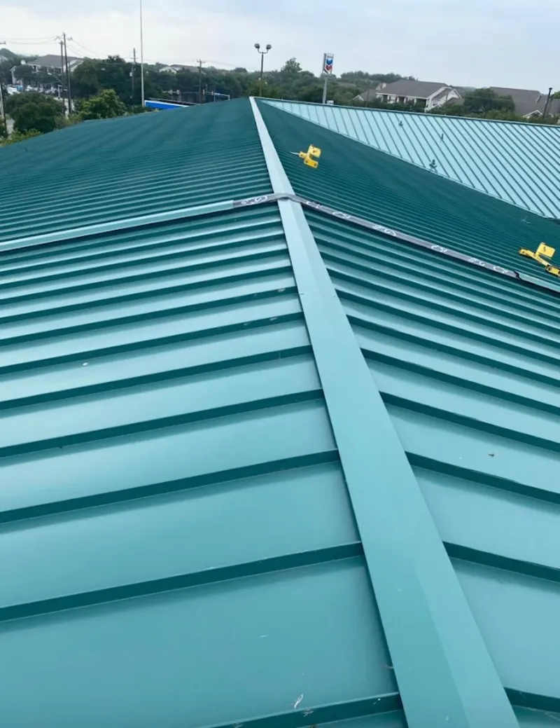 Green commercial metal roof ridge and valley for Metal Roof Repair in Orangetree